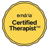 EMDRIA Certified Therapist seal: a scalloped yellow circle reading emdria, Certified Therapist